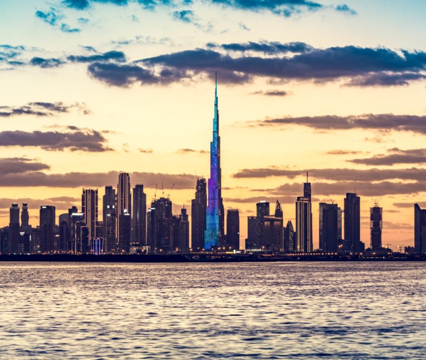 Skyscrapers highrise skyline of Dubai UAE downtown with Burj Khalifa at sunset